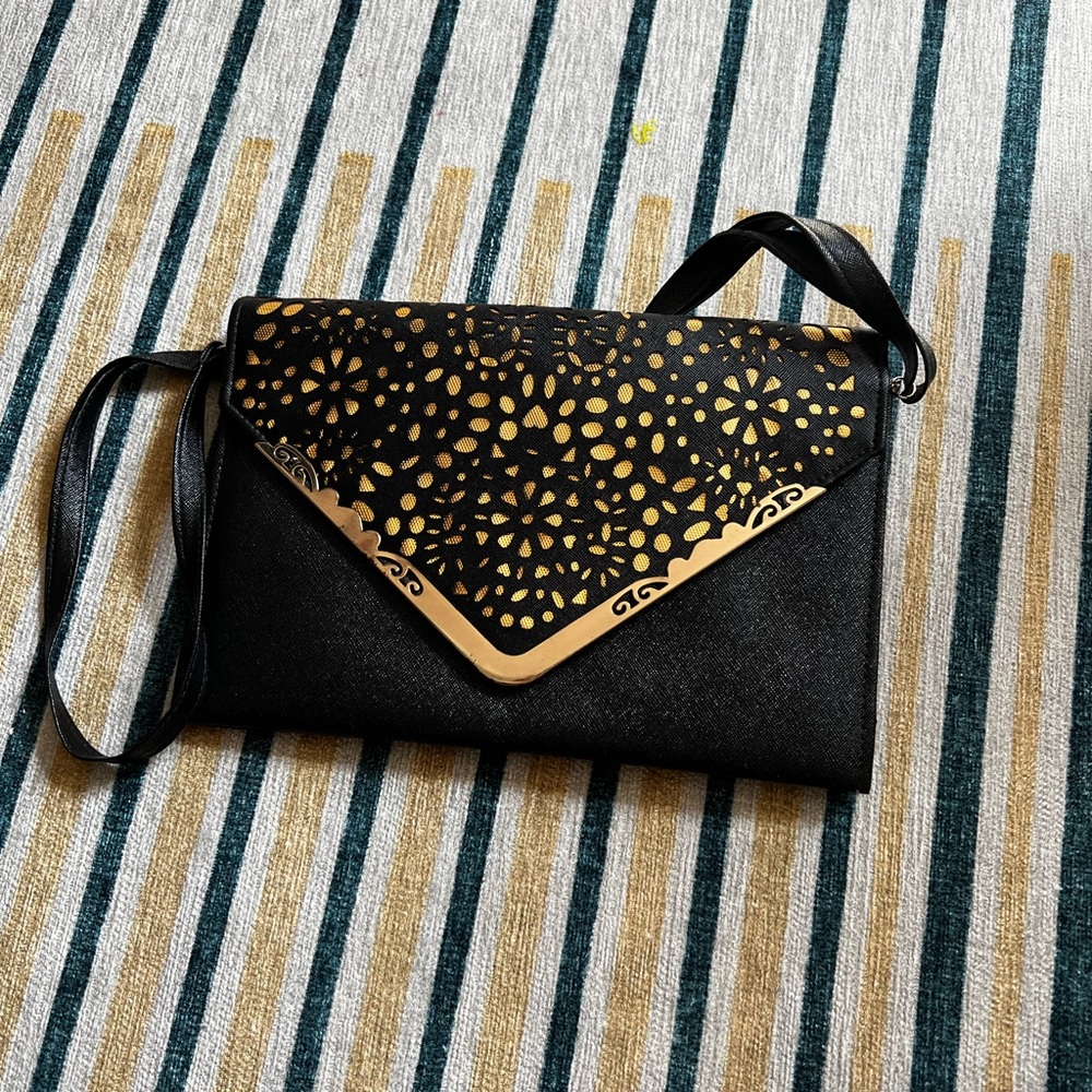Black and golden purse unbranded